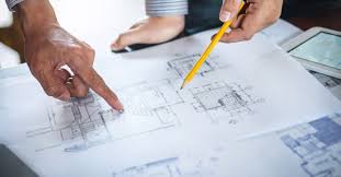 PowerNaturally engineering team reviewing system drawings
